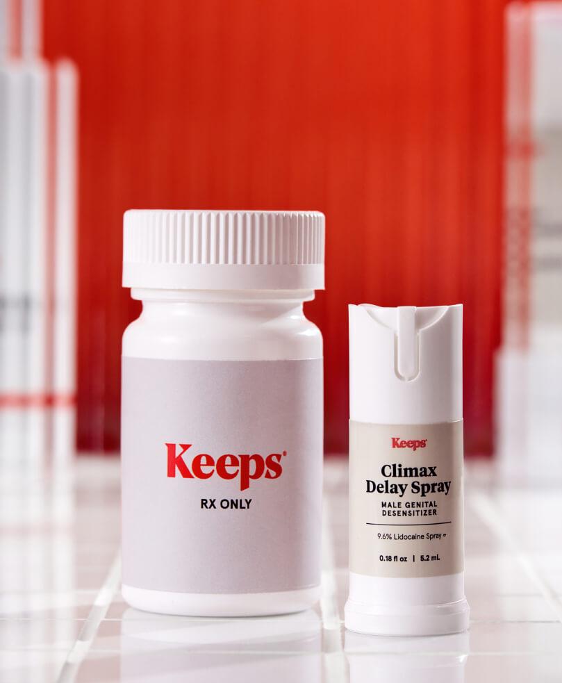 Keeps prescription bottle and Climax Delay Spray on tile with blurred red background