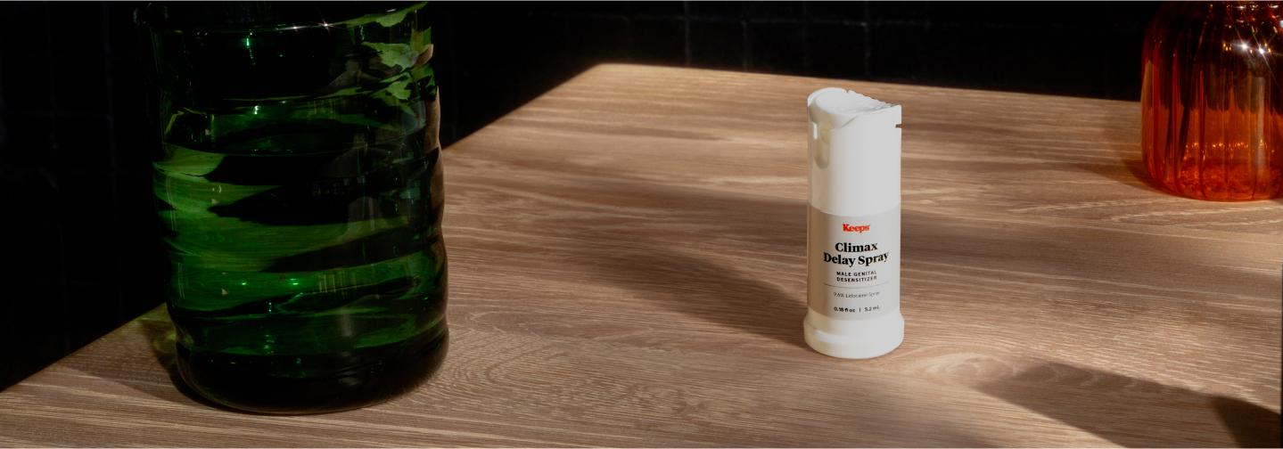 Climax Delay Spray on table