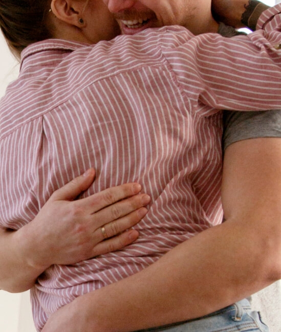 Two people hugging