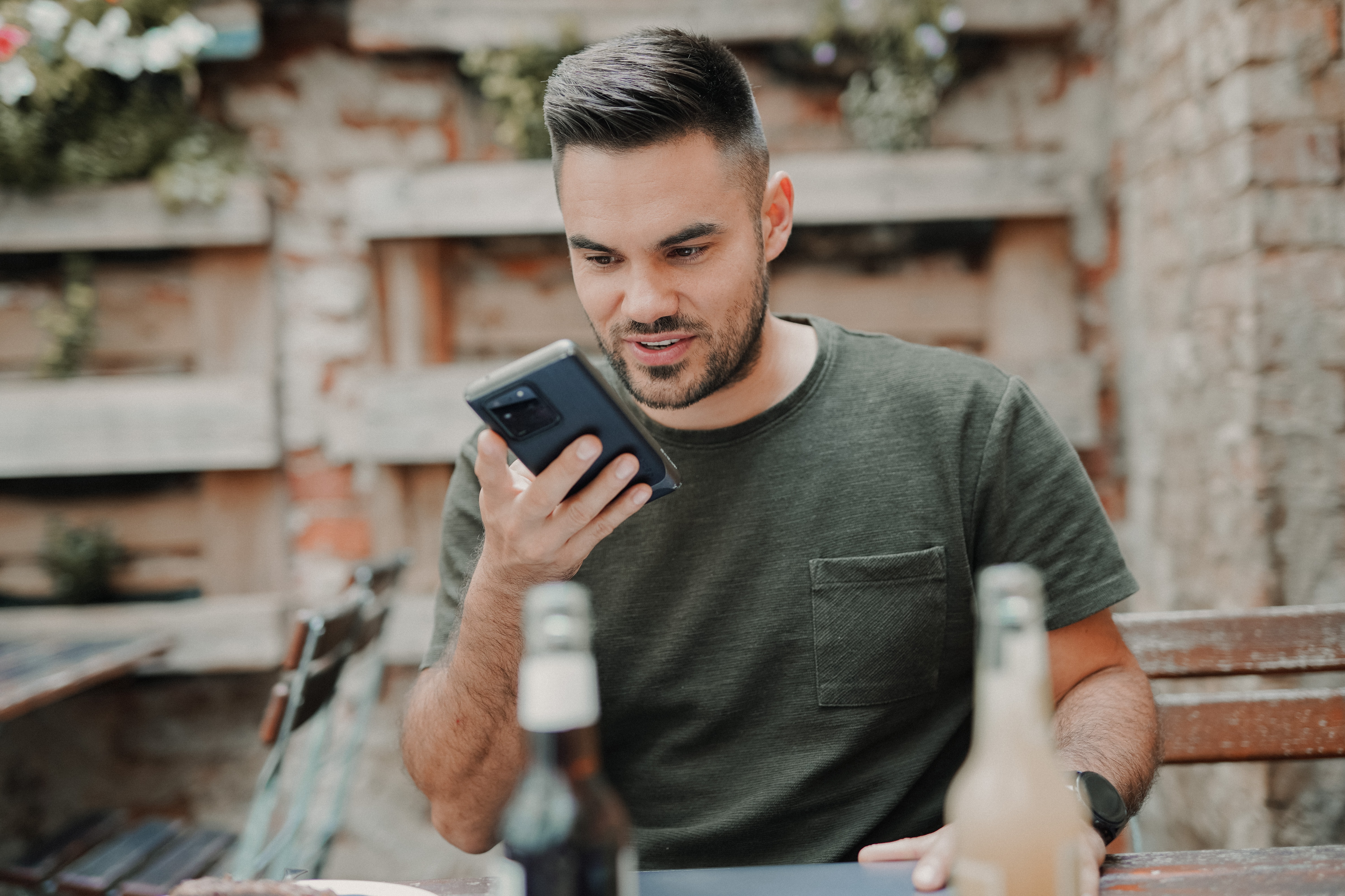 Man on phone (Unsplash)